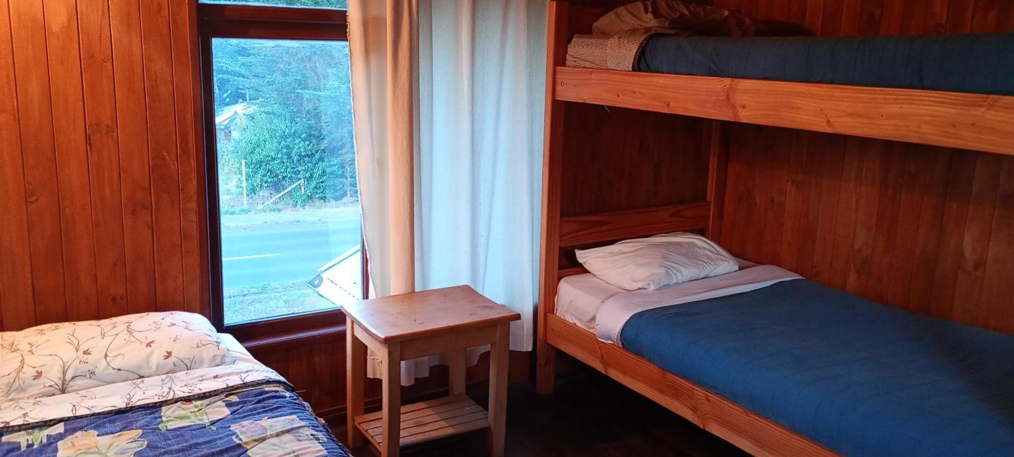 Hostal Quillelhue プコン 部屋 写真